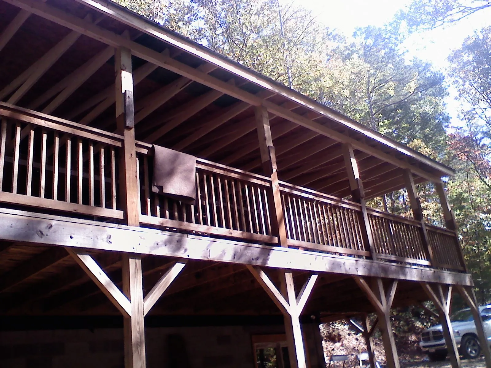 Timber framing under a new elevated porch and deck — Roof Leak Repair in Comstock Park by Roofing Brothers